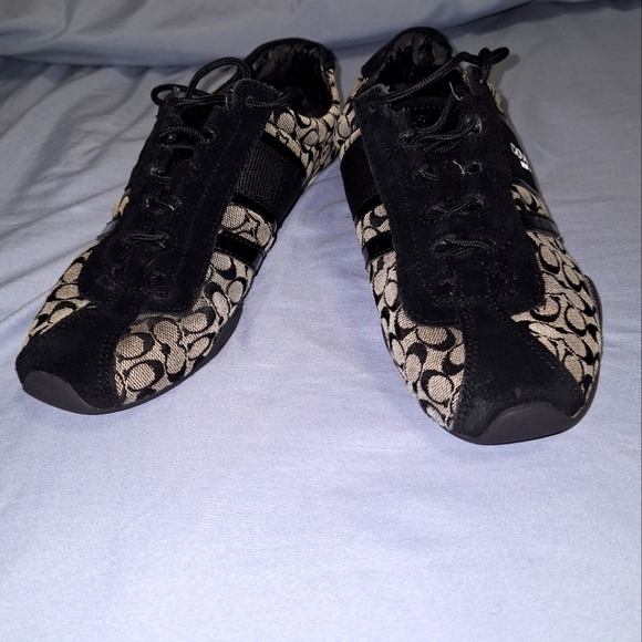 Coach Shoes - A pair of Coach sneakers in a ladies size 7.5B. Pre-loved with some flaws